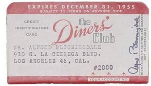 An early cardboard version of the Diners Club card.